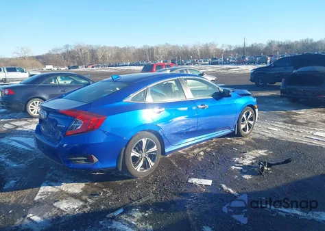 2018 Honda Civic Touring z USA, uszkodzony, nr VIN JHMFC1F95JX017753